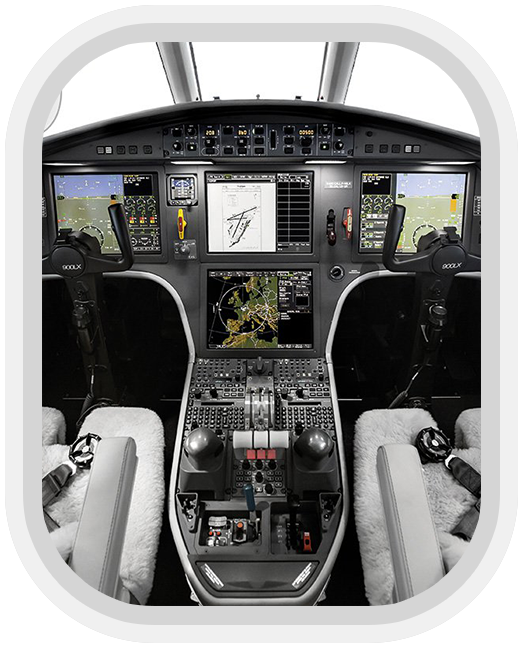 A picture of an airplane cockpit with the controls.